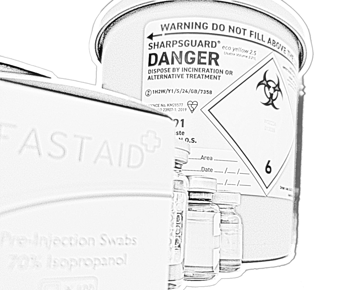 Black and white picture of a box of alcohol swabs, glass vials, and a large sharps disposal bin.