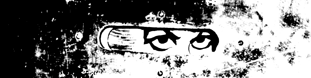 A pair of eyes staring through a speakeasy.